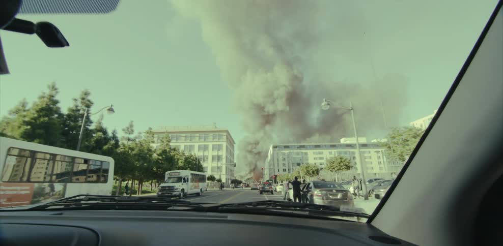 Smoke plums from a fire on the street