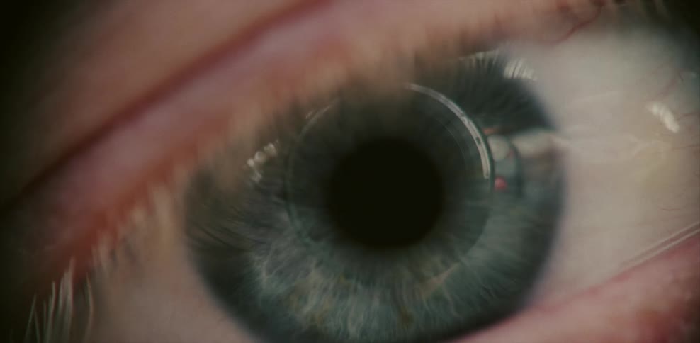 A blue eyeball looks around and blinks