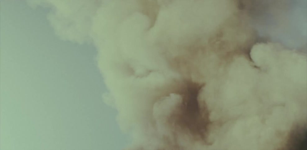 Large cloud of smoke rising into the air