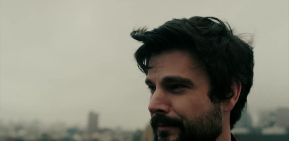 Close up of man's face looking down