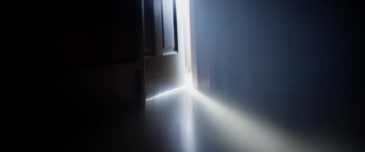 Close up of a door illuminated by bright light