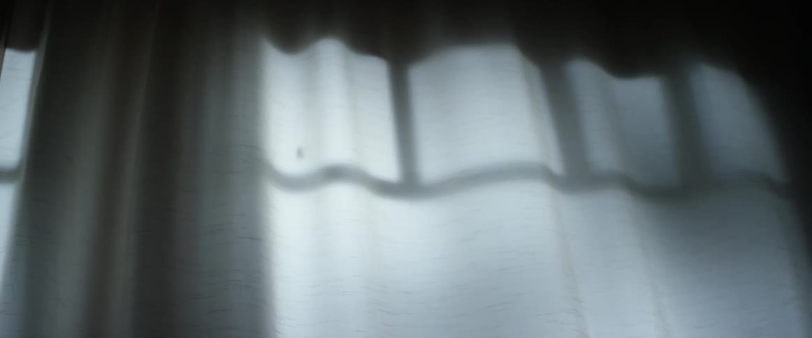 Drapes cover a window