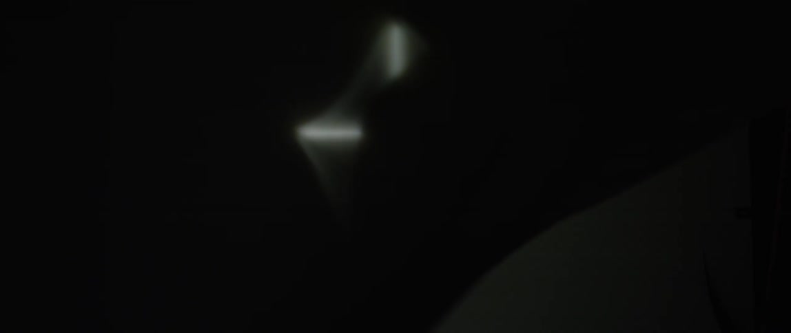 Dark fabric billowing and floating