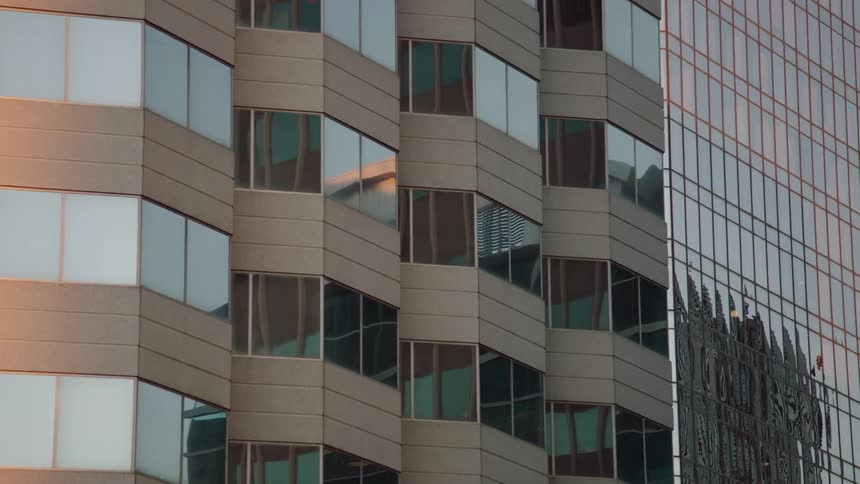 Side of a tall building with many windows