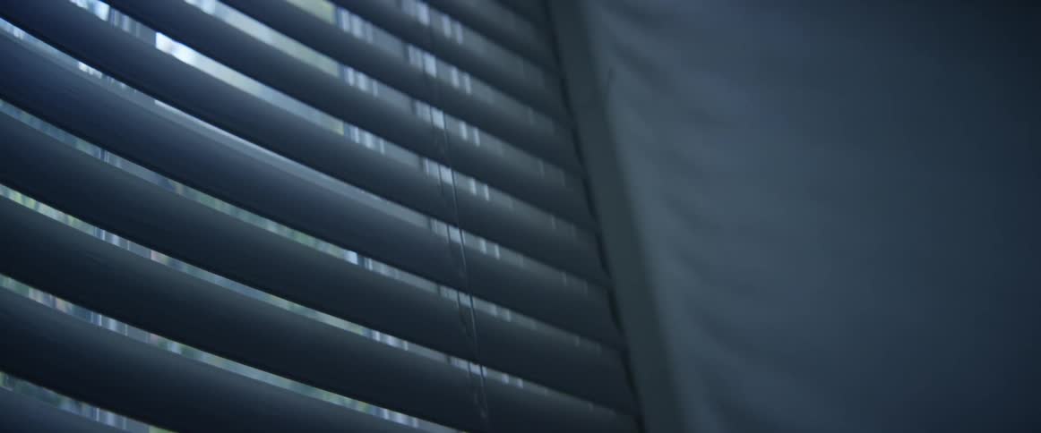 Light shining through window blinds
