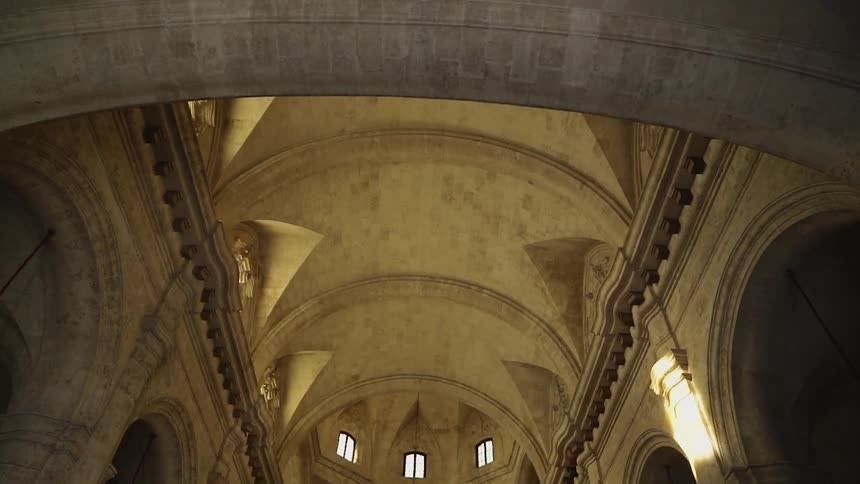 Ceiling view of a lit up church