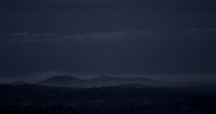 View of mountains on a cloudy evening