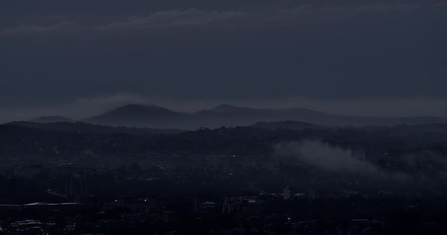 View of mountains on a cloudy evening