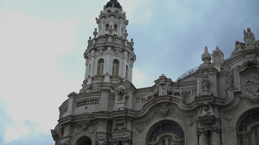 The tall tower is made of stone