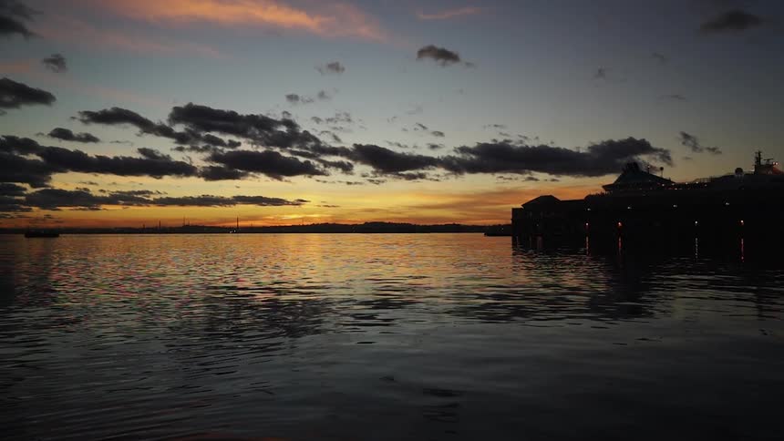 The water is calm at dawn
