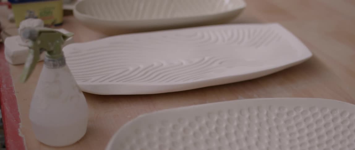The table is lined with ivory colored plates