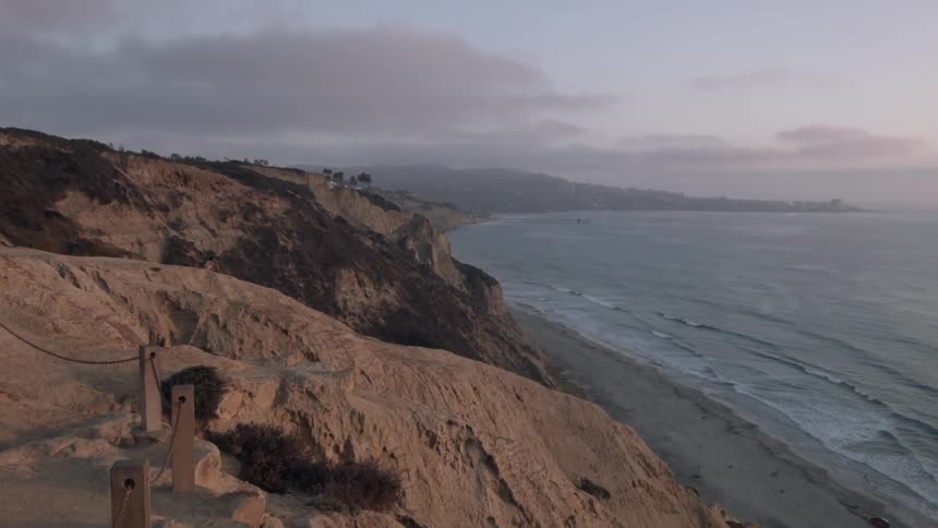 Aerial view of a seaside at sunset