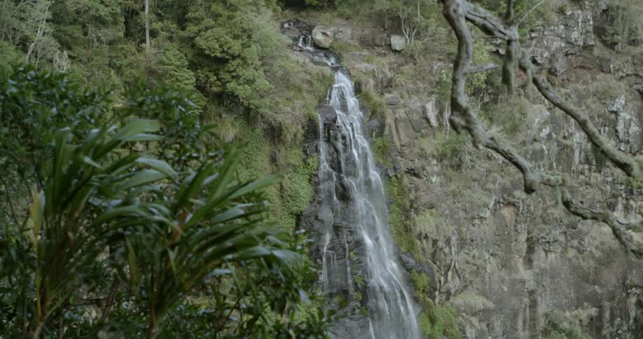 Small waterfall splashing off a rock formation