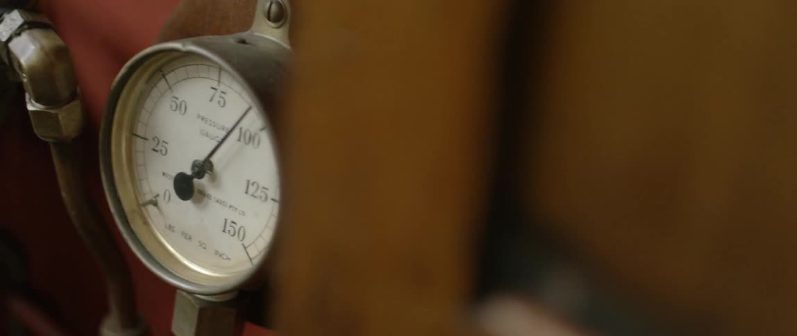 A gauge bobs between 75 and 100