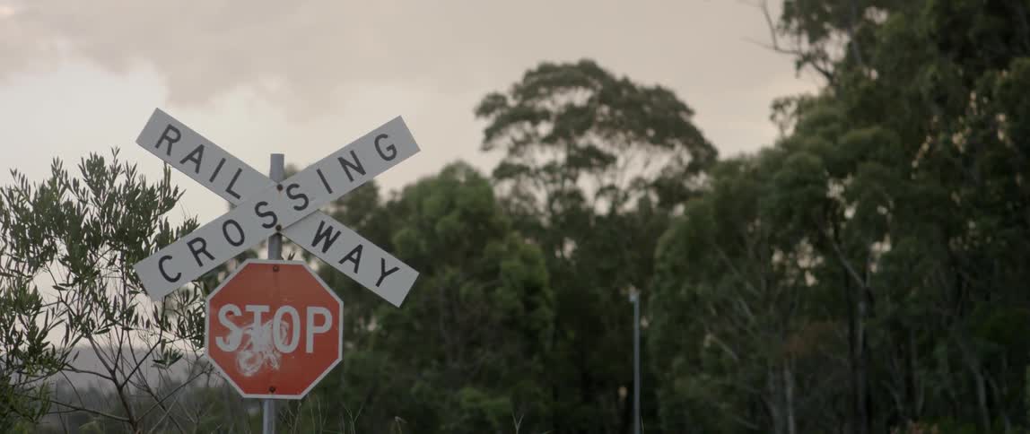 A sign warns of a railroad crossing