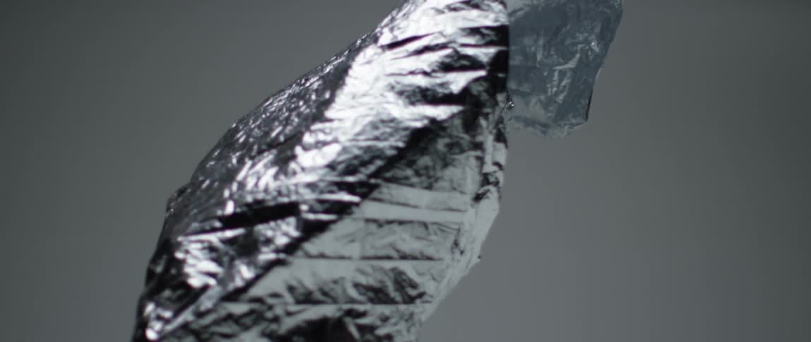 Aluminum foil floating downwards