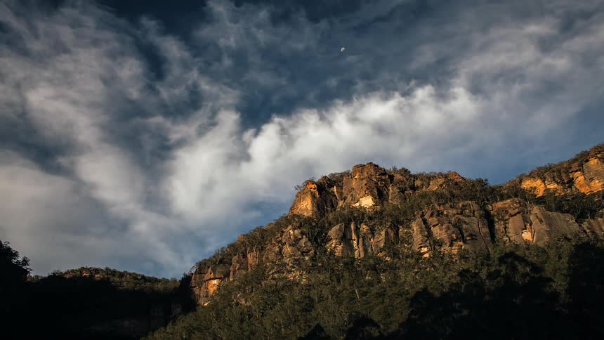 Time lapse of close passing a mountain