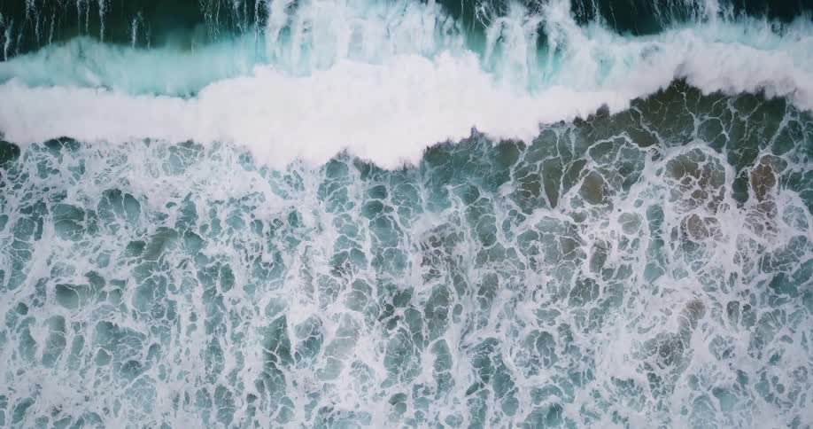 The waves splash slowly against the shore