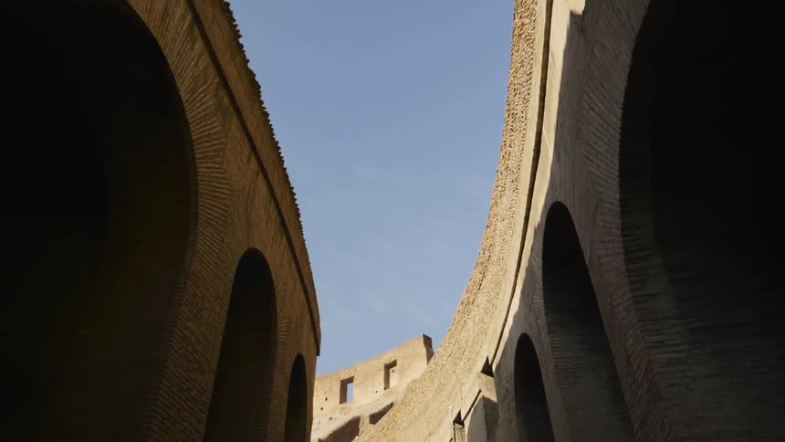 Sunlight shines down on a stone structure