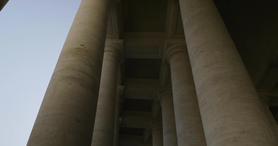 The tall pillars line the clear sky