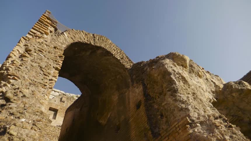Archway of an ancient building on a sunny day
