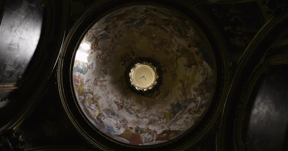 The ceiling is domed and lined with art