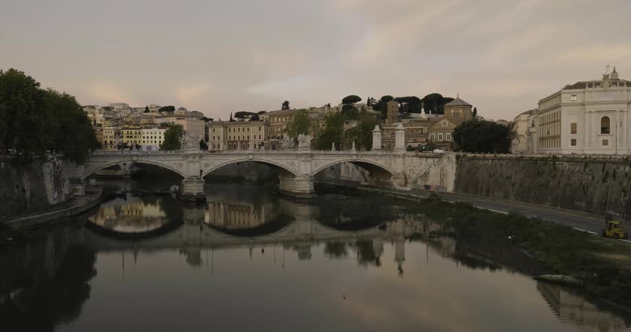 Cars drive across the small bridge ahead