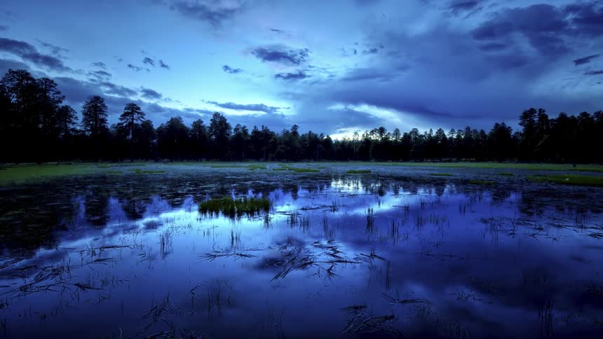 The lake is calm at dawn