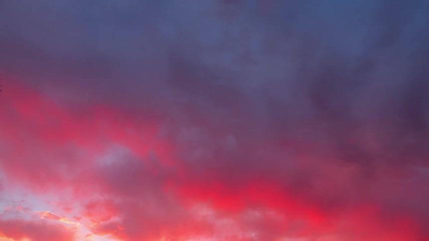 The dawn sky is showing the clouds move