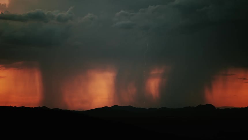 The large storm ahead pours rain and lighting in three areas at once