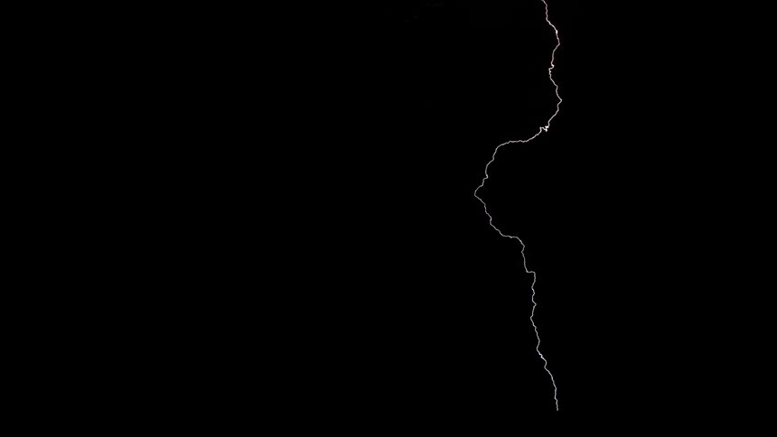 Lighting streaks through the night sky