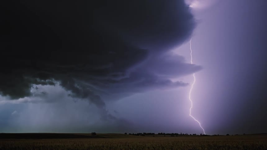 Lightning flashing in the sky at night