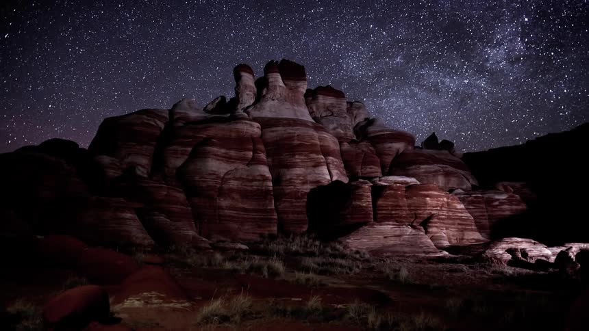 Stars shining over rocky mountains
