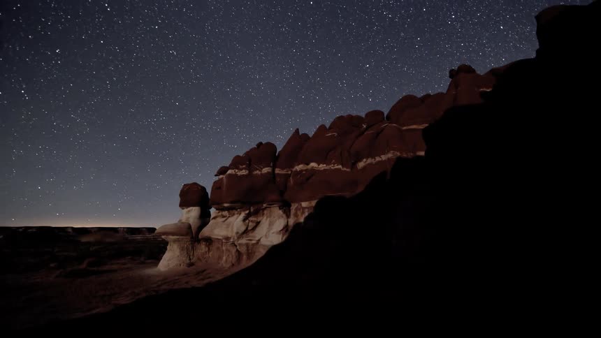 The stars pass fast over the cliff