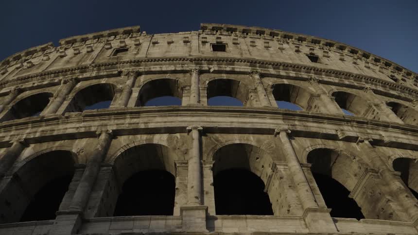 A colosseum has many floors and arches