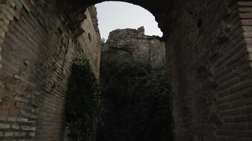 An archway in an old structure stands overhead