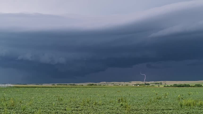 Clouds rolling over grassy plains