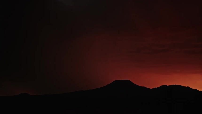 Lighting is flashing in the dawn sky