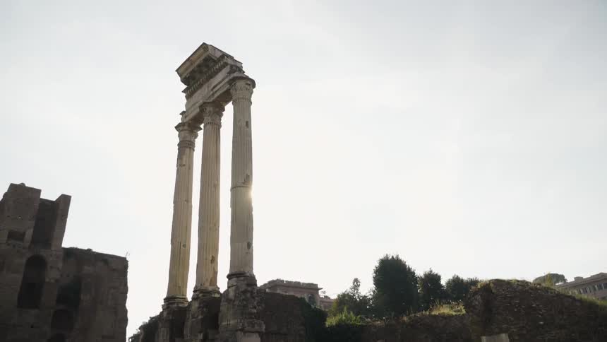 Columns hold up the remains of a pediment at an ancient ruin site