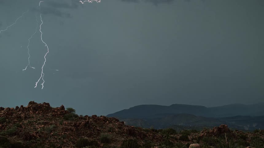 Lightning strikes a small hill