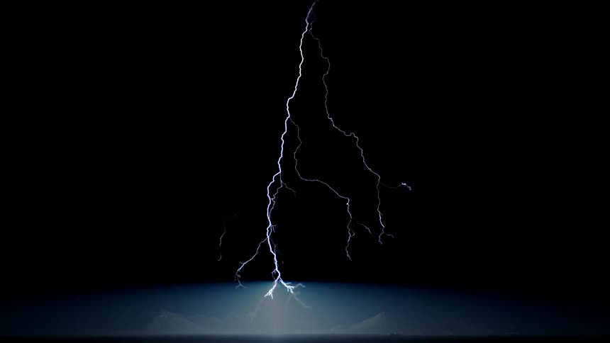 A flash of lightning strikes the night sky