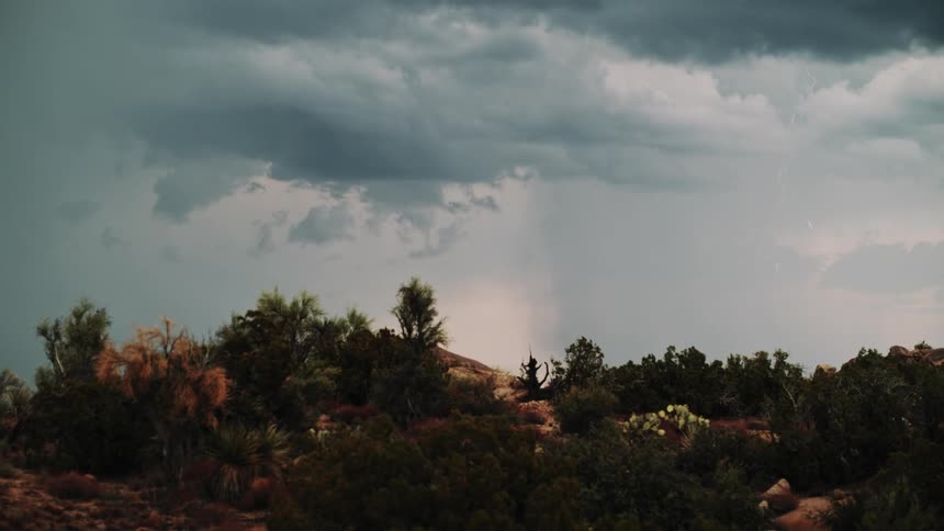 Rain clouds in the distance pour rain