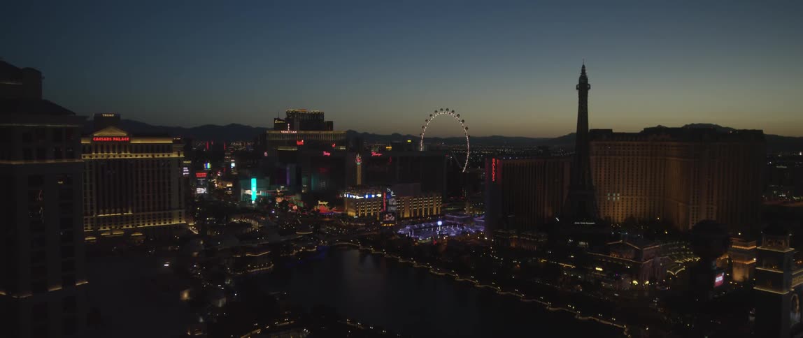 A large bright lit city at sunset
