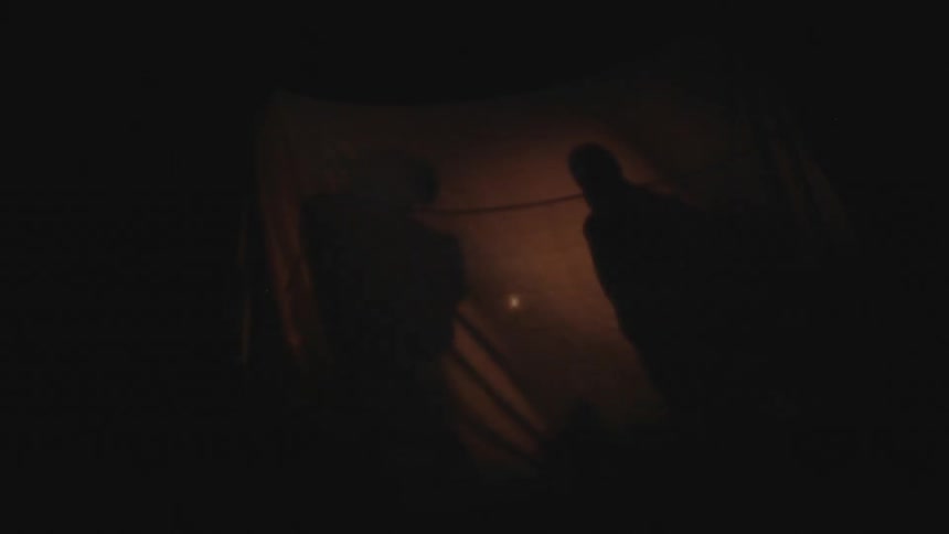 People inside of a tent