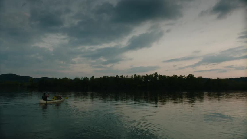 People riding on a raft