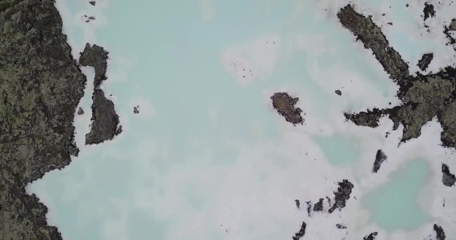 An aerial view of a large expanse of icy tundra