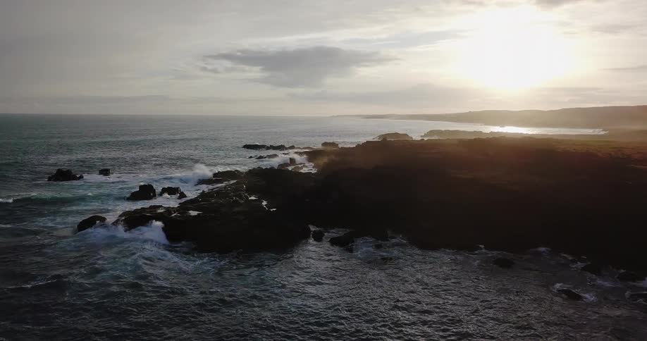 Waves splashing onto a rocky shore