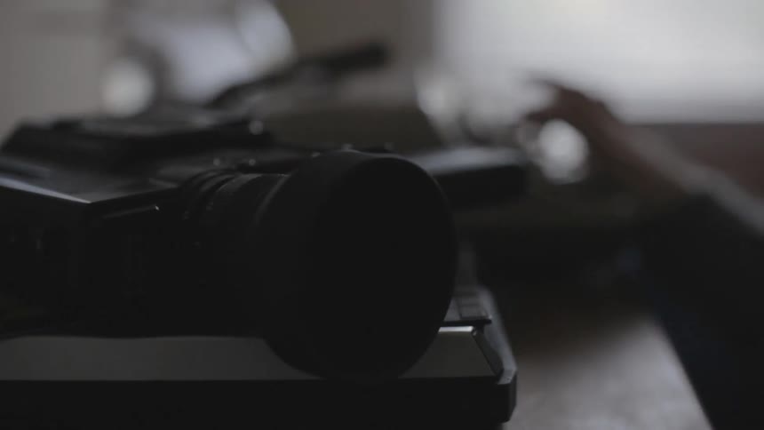 Hands typing on a typewriter
