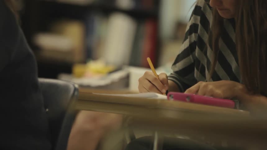 Students do work at their desks