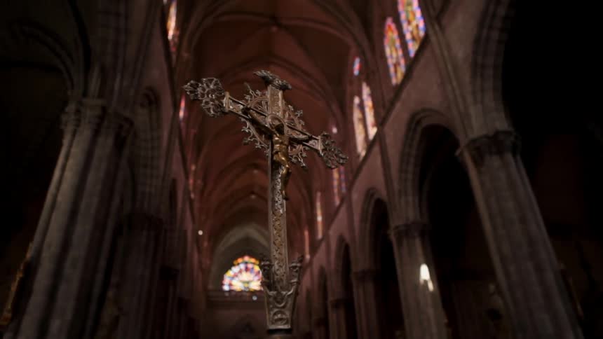 An ornate cross in a church